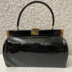 Black vintage patent leather handbag; excellent condition. Approx. 6 inches tall